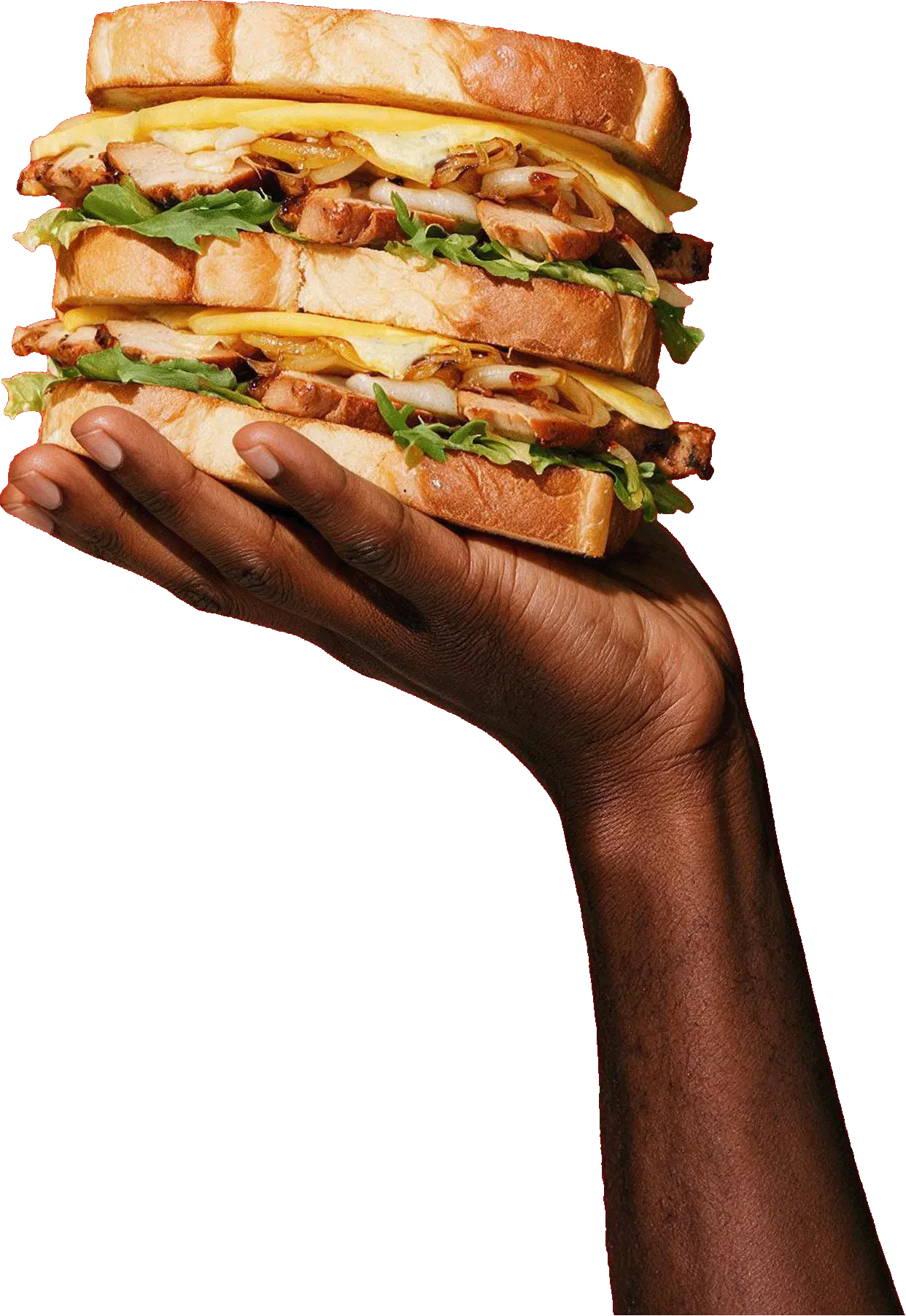 Mano sosteniendo un sándwich doble de pollo y queso con pan Panrico